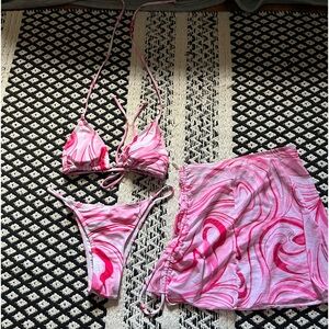 super adorable pink and white swirl bathing suit with cover skirt!!